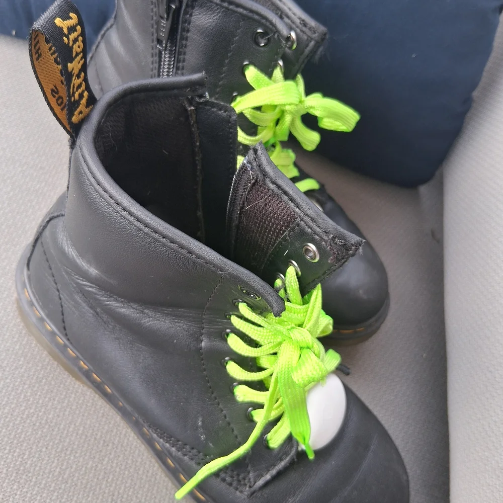 Dr. Martens Kids Black Boots with Bright Green Laces